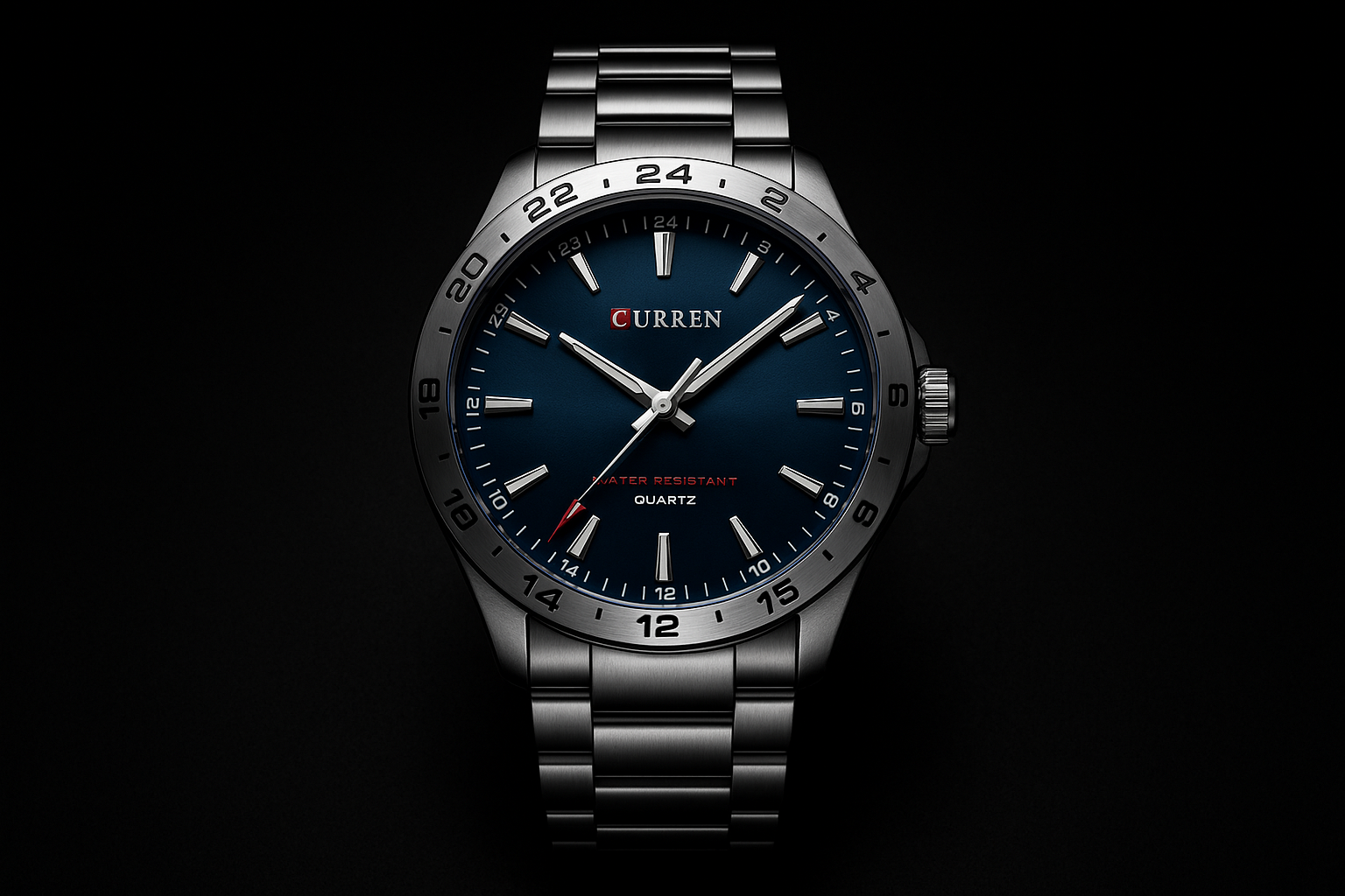 watch with blue dial and silver metal strap on black background